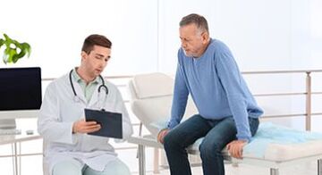 The doctor talks to the patient