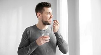 men are taking medication to treat prostatitis