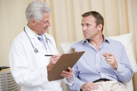 The doctor prescribes medicine to a patient with prostatitis.